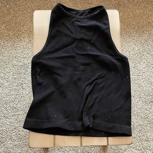 Woman’s black tank top